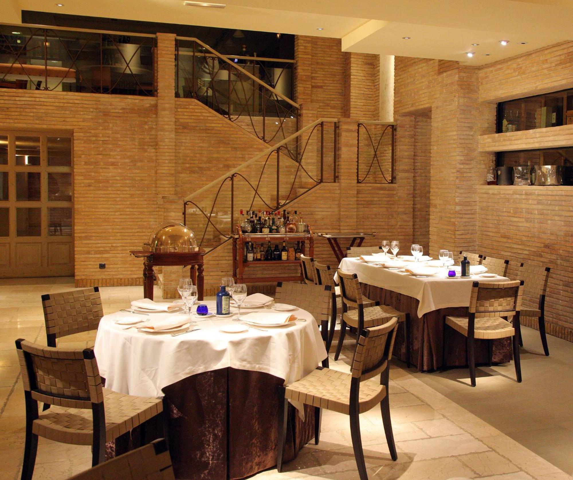 Hotel Palafox Zaragoza Dış mekan fotoğraf Interior of the restaurant